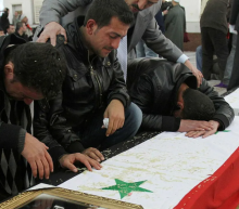 AP PHOTO of The funeral of the victims of the attack on Al-Hassan Mosque in Damascus, Jan 2012 from Haaretz article