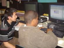 Chan Saelee tutors a student