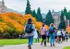 UW Quad in autumn with students walking across the quad.